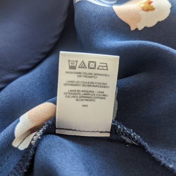 Floral blue with white and red. Size is extra small but easily fits small. - Picture 5 of 6